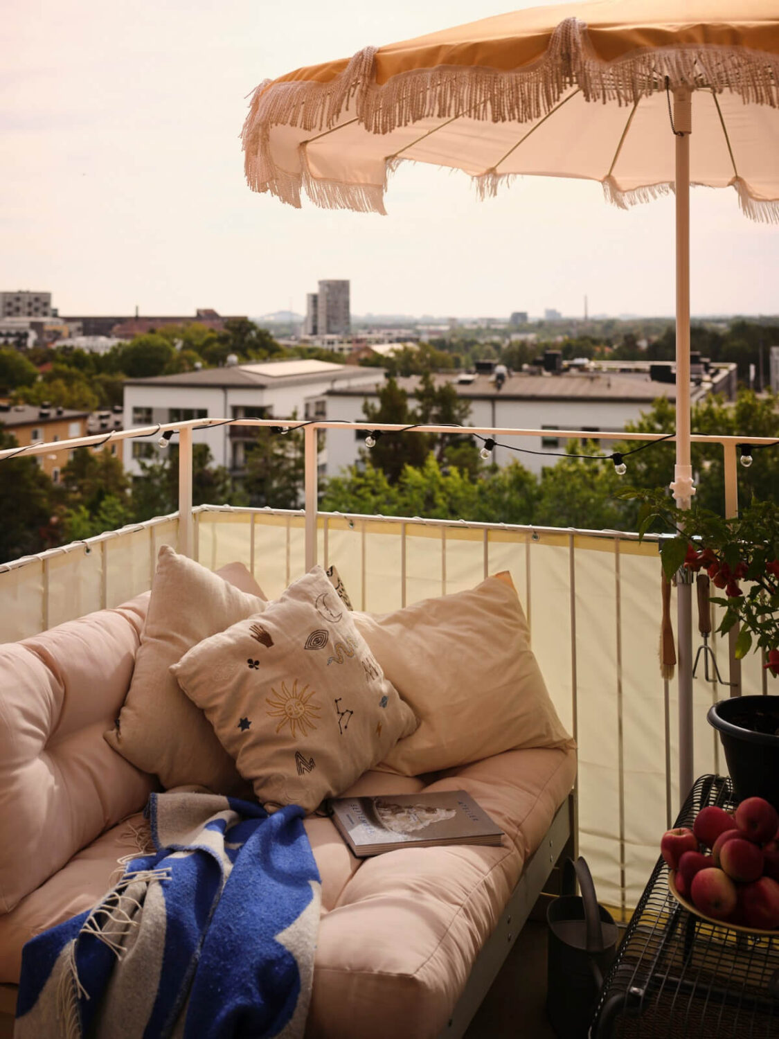 A 1940s Swedish Apartment with a Soft Yellow Kitchen 5 balcony seating