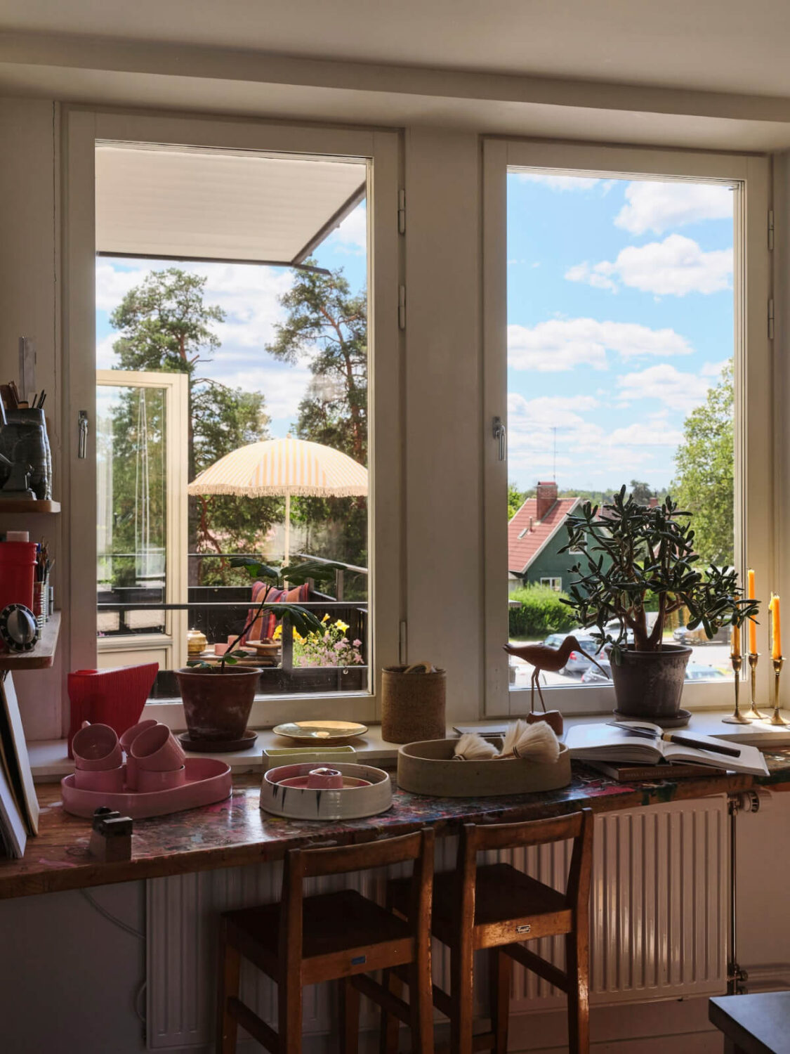 A Bright Family Apartment in a 1950s School Building 13 bar table under window