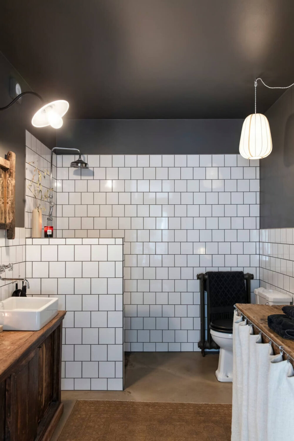 An Open-Plan Gray Home in a Former Textile Factory 10 bathroom classic white tiles gray ceiling nordroom