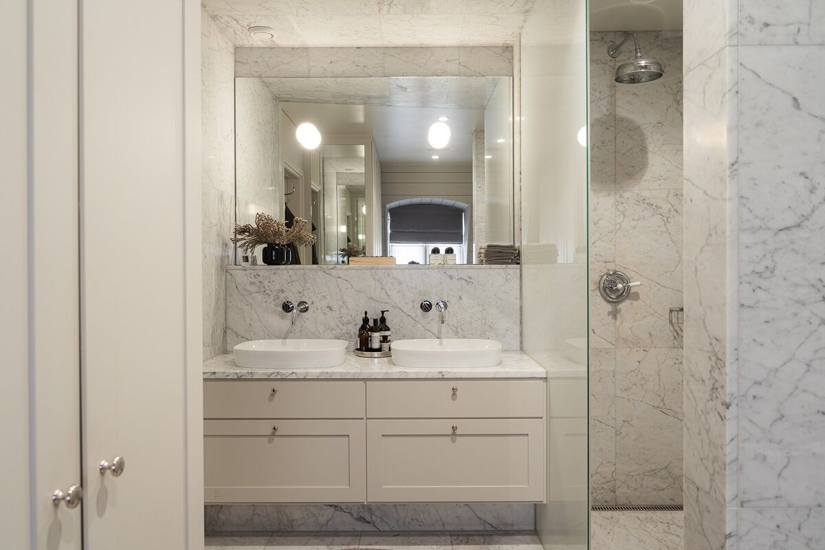 A Stylish Penthouse Apartment with Exposed Beams 29 bathroom double sink