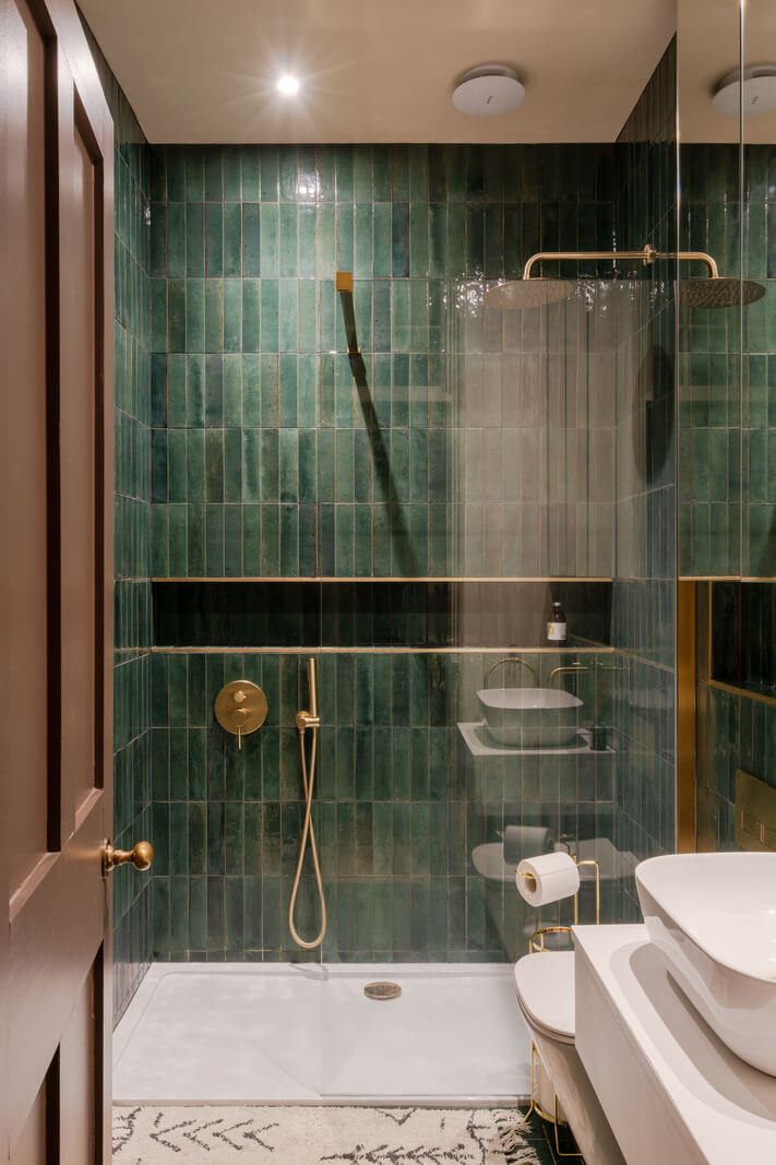 Vibrant Colors in a 19th-Century Regency Townhouse in England 27 bathroom green shower tiles brass fittings