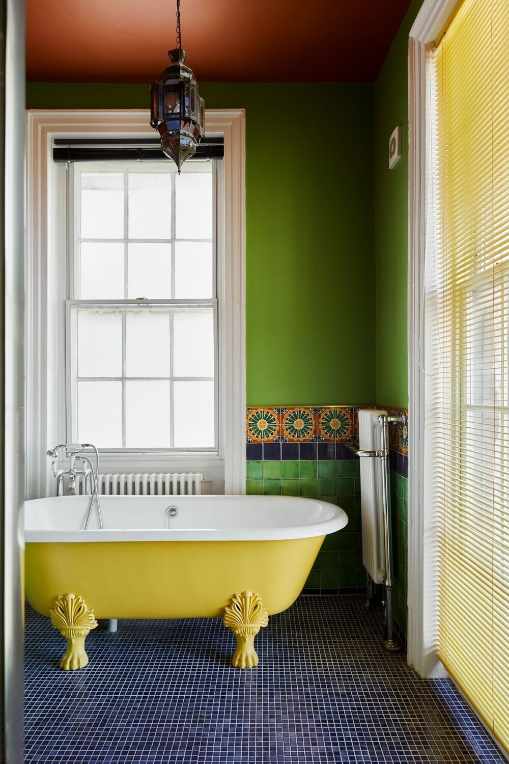 40+ Colorful Bathrooms That Will Spruce Up Your Home 24 bathroom-green-walls-red-ceiling-yellow-clawfoot-bath-nordroom