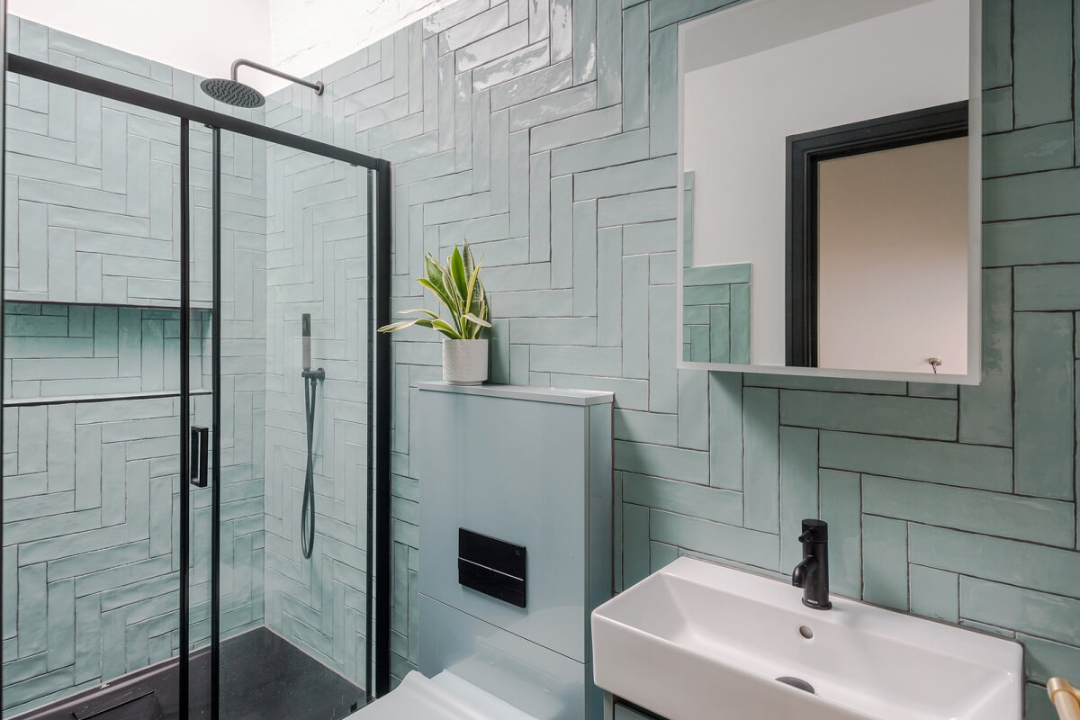 The Color Trends for 2025: Warm, Natural Shades and a Cheerful Accent 75 bathroom light blue tiles skylight