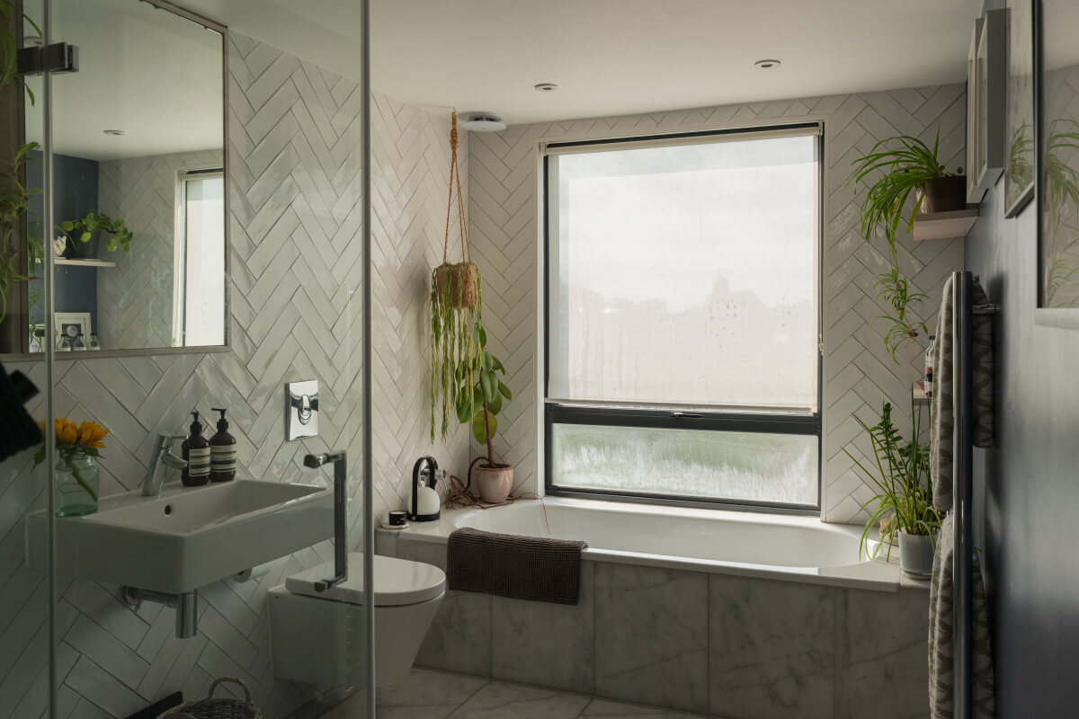 Exposed Brick and Wooden Beams in an Extended London Home 36 bathroom marble tiles herringbone wall tiles bath and shower
