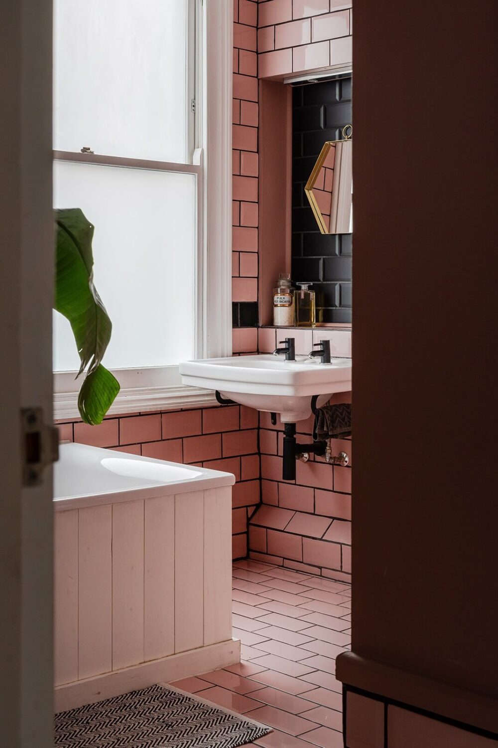 40+ Colorful Bathrooms That Will Spruce Up Your Home 9 bathroom-pink-tiles-nordroom