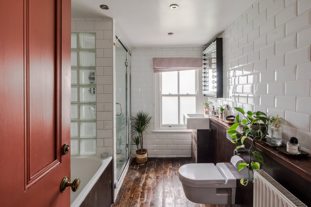A Victorian Home with a Rich Color Palette and a Beautiful Garden 21 bathroom-reclaimed-wooden-floor.
