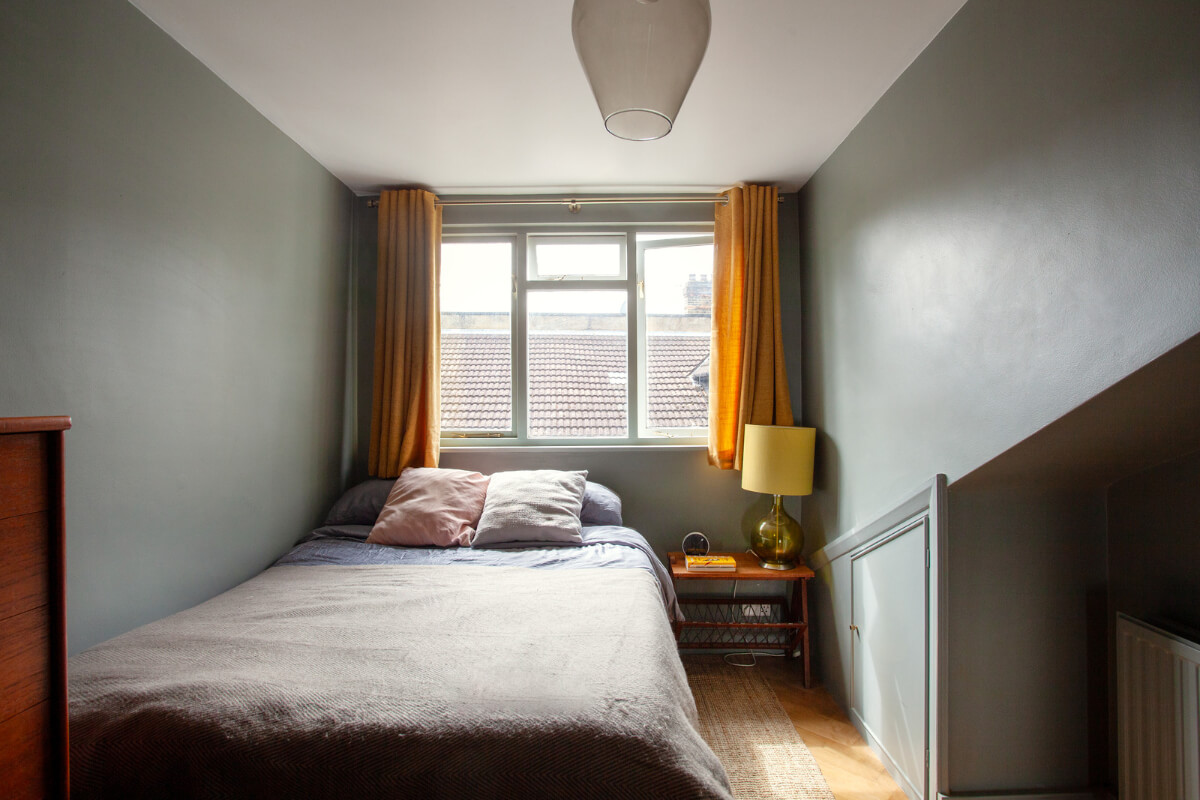 Pastel Tones and Midcentury Design in a Top Floor London Apartment 16 bedroom blue-green walls