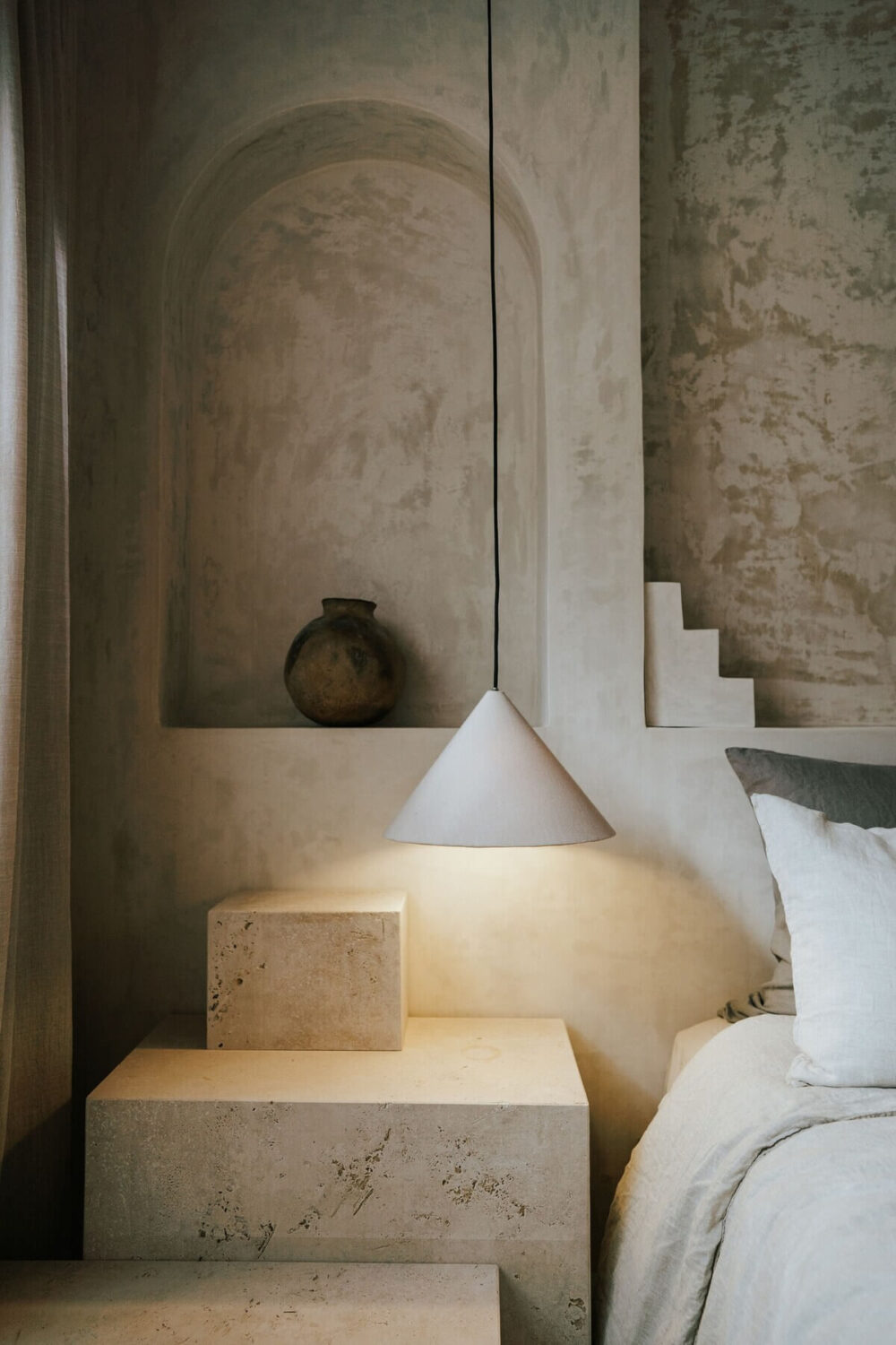 A Serene Design Apartment in Tulum 11 bedroom-detail-sculptural-forms-niche-nightstand-nordroom