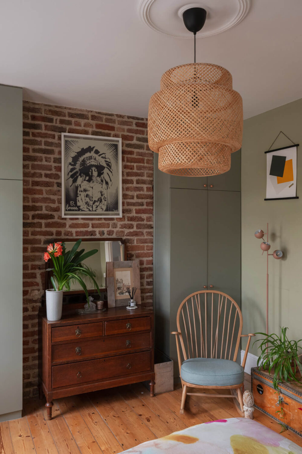 Exposed Brick and Wooden Beams in an Extended London Home 22 bedroom exposed brick gray wardrobes antique dresser