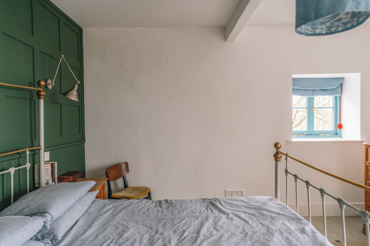 A Colorful 19th-Century Cottage in the Lake District 13 bedroom green feature wall