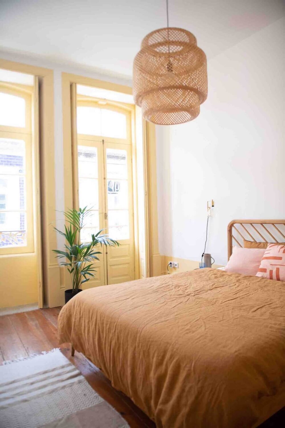 A Colorful Airbnb Apartment in Portugal 13 bedroom light yellow woodwork