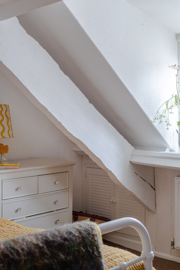 A Charming 400-Year-Old Cottage in England 14 bedroom slanted ceiling A Charming 400-Year-Old Cottage in England