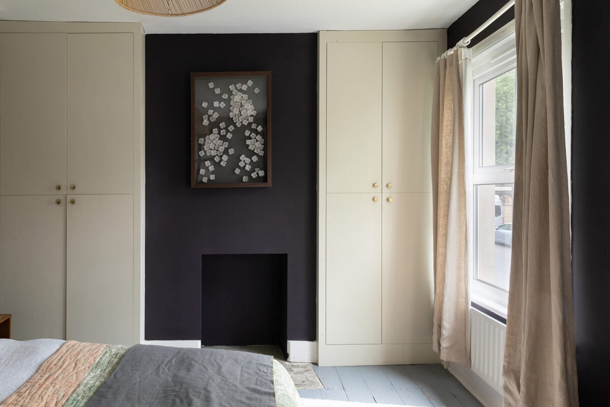 A London Family Home with a Light Modern Extension 17 bedroom with black accent wall