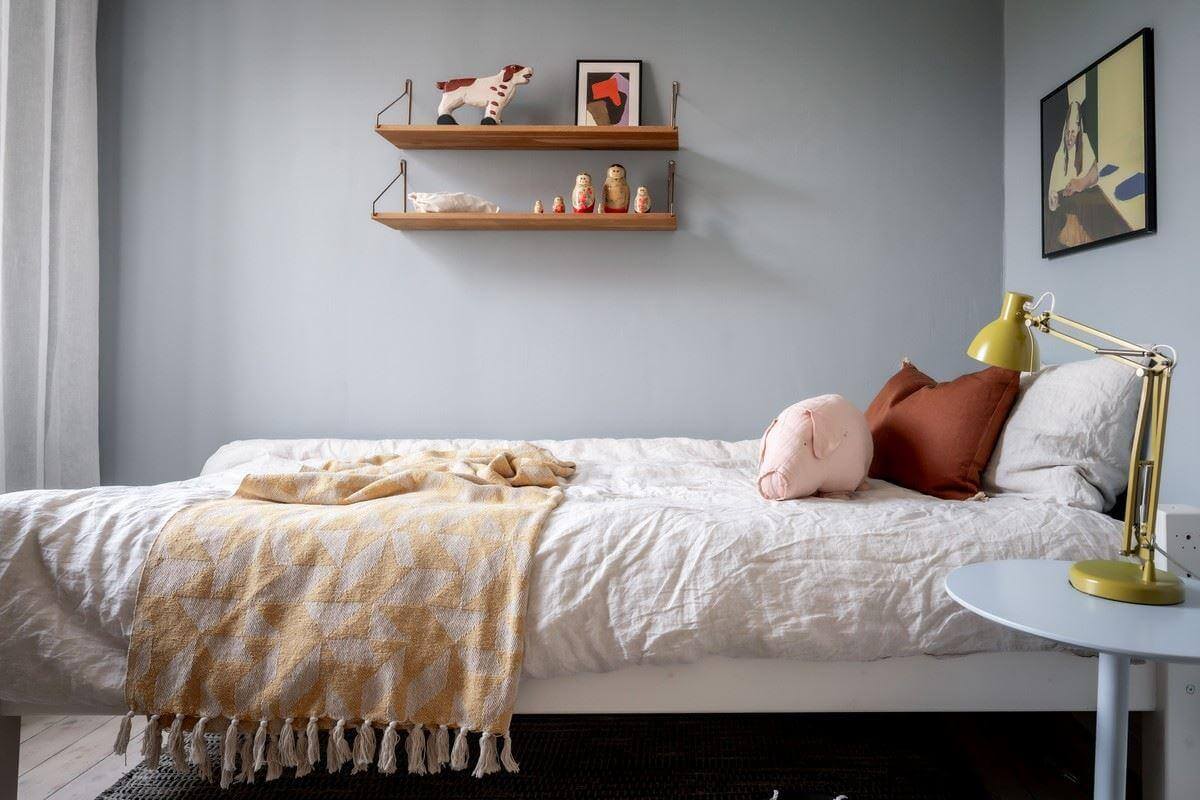 bedroom with blue gray walls