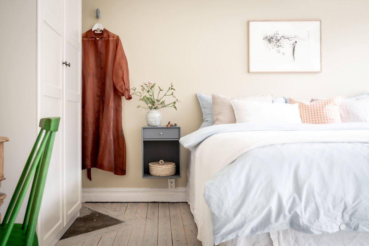 bedroom with floating nightstand