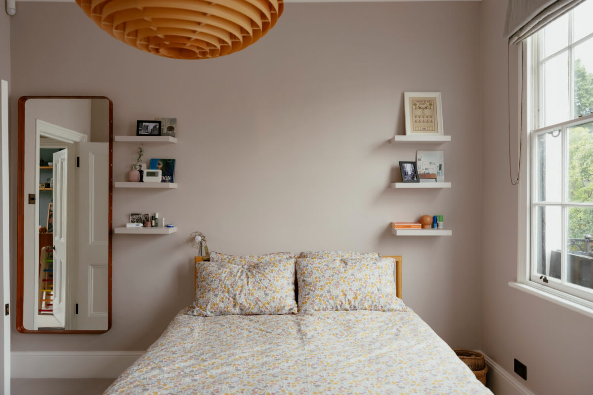 A Renovated Victorian Townhouse with a Small Split-Level Garden 21 bedroom with shelves instead of bedside tables