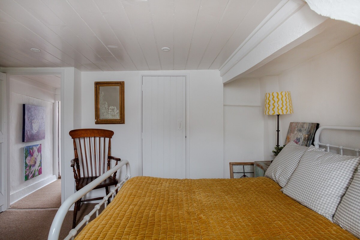 A Charming 400-Year-Old Cottage in England 12 bedroom yellow bedding