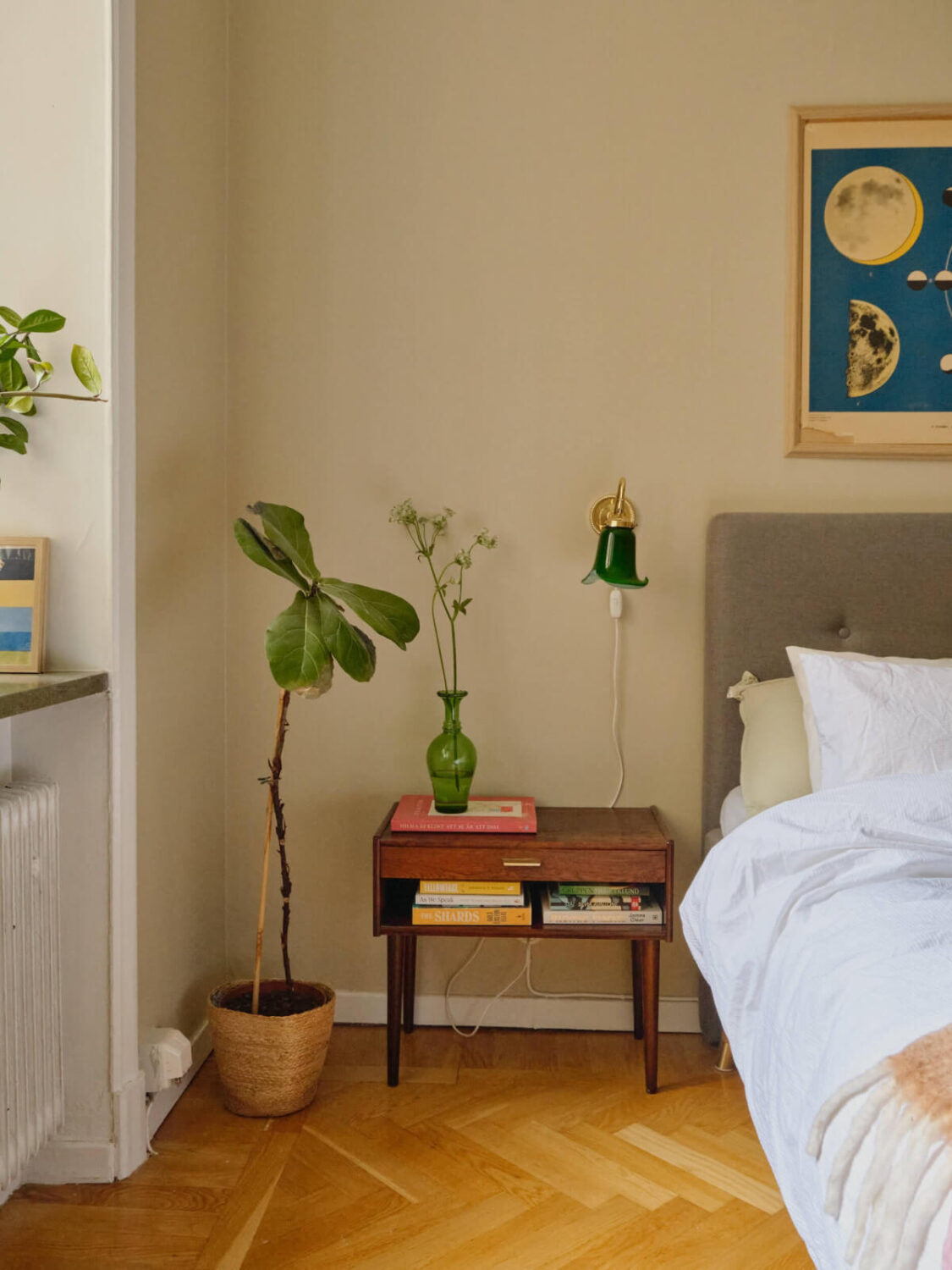 A Beautiful Color Palette and Historic Elements in a Stockholm Apartment 22 bedside table