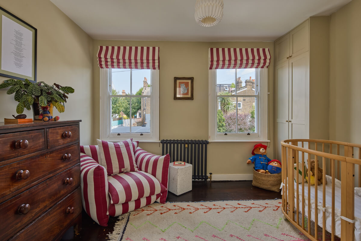 A 19th Century London Cottage with a Stunning Kitchen Extension 23 beige nursery red striped chair and curtains