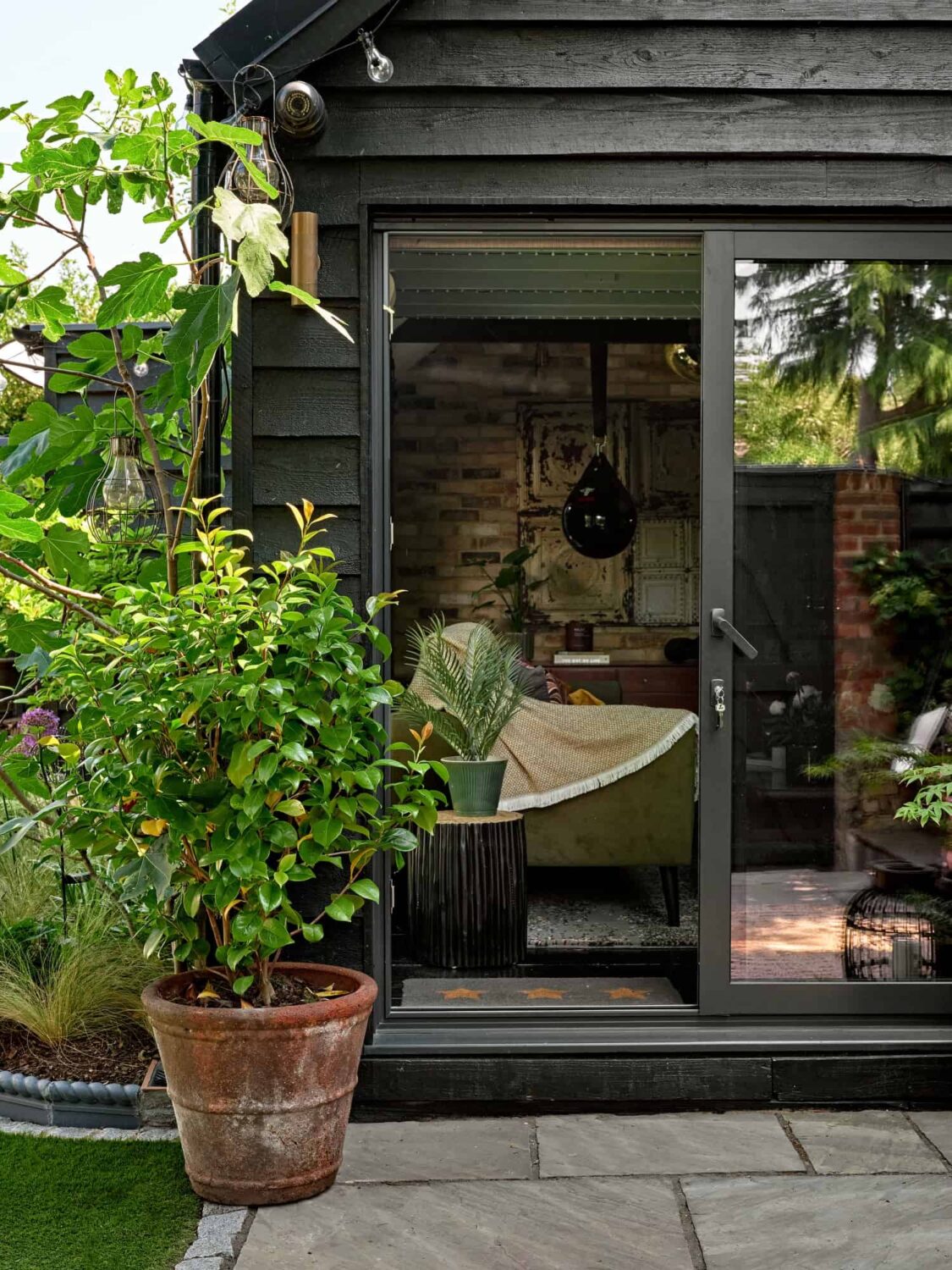 Pink & Gray Rooms in a Victorian Home with a Guest House 23 black cladded garden house