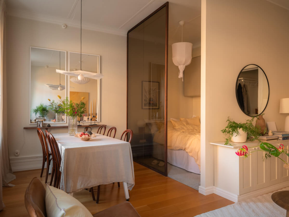 A 19th Century Apartment with a Dark Glass Room Divider 5 black glass room divider