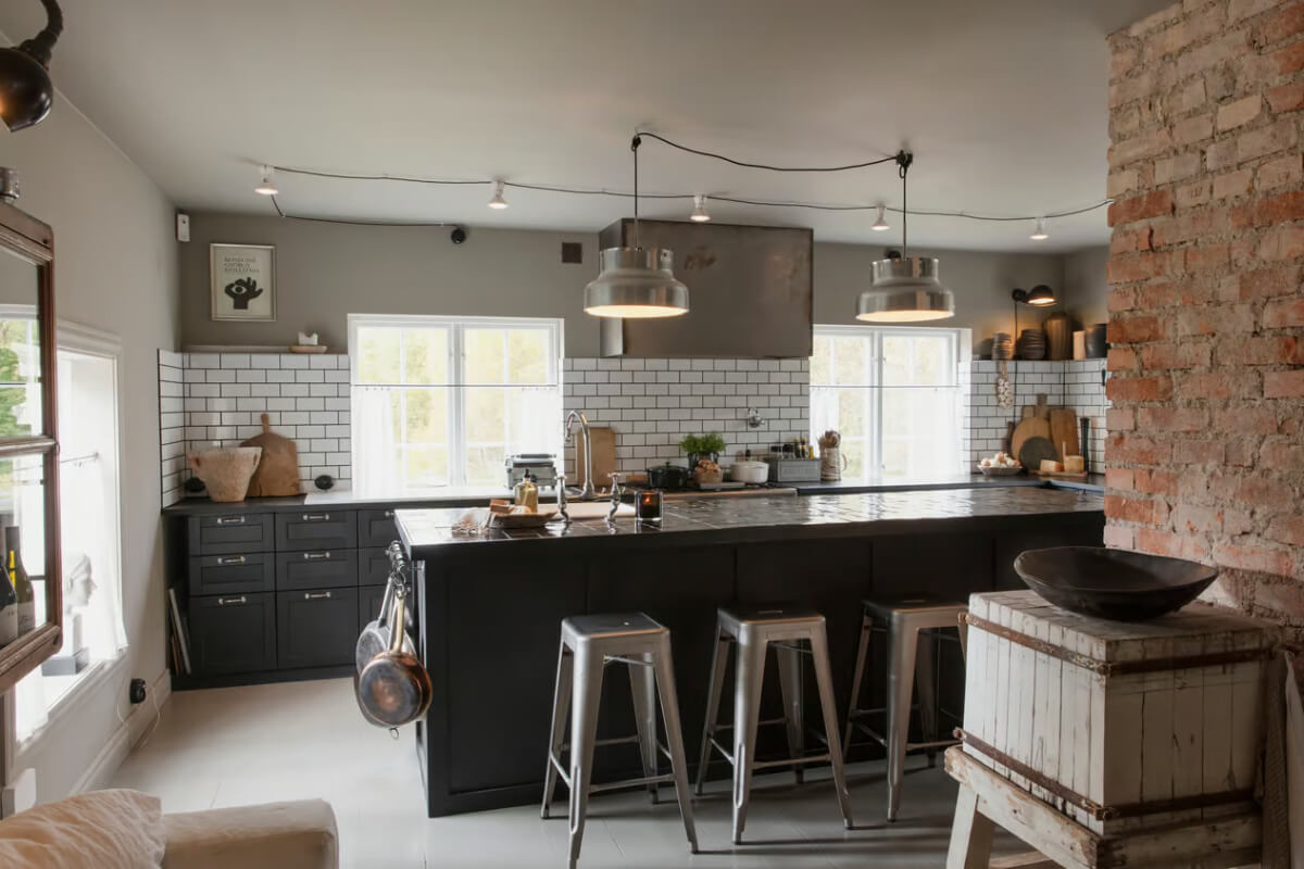 An Open-Plan Gray Home in a Former Textile Factory 6 black kitchen island bar seating