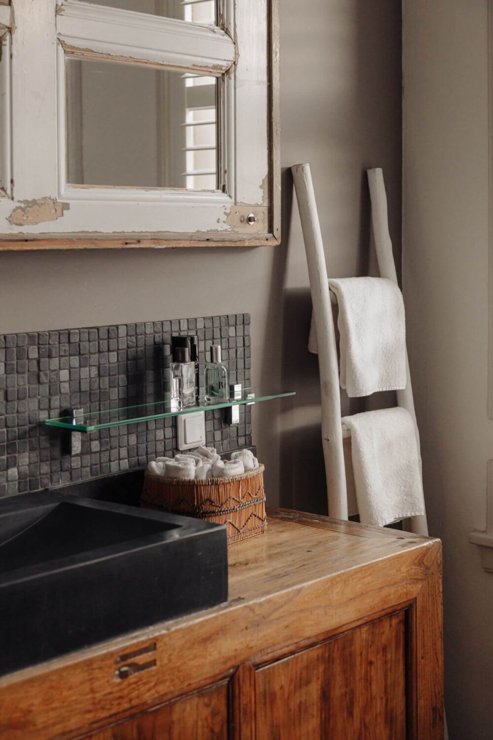 A Charming Amsterdam Townhouse with a Cozy Roof Terrace 13 black sink and wooden vanity