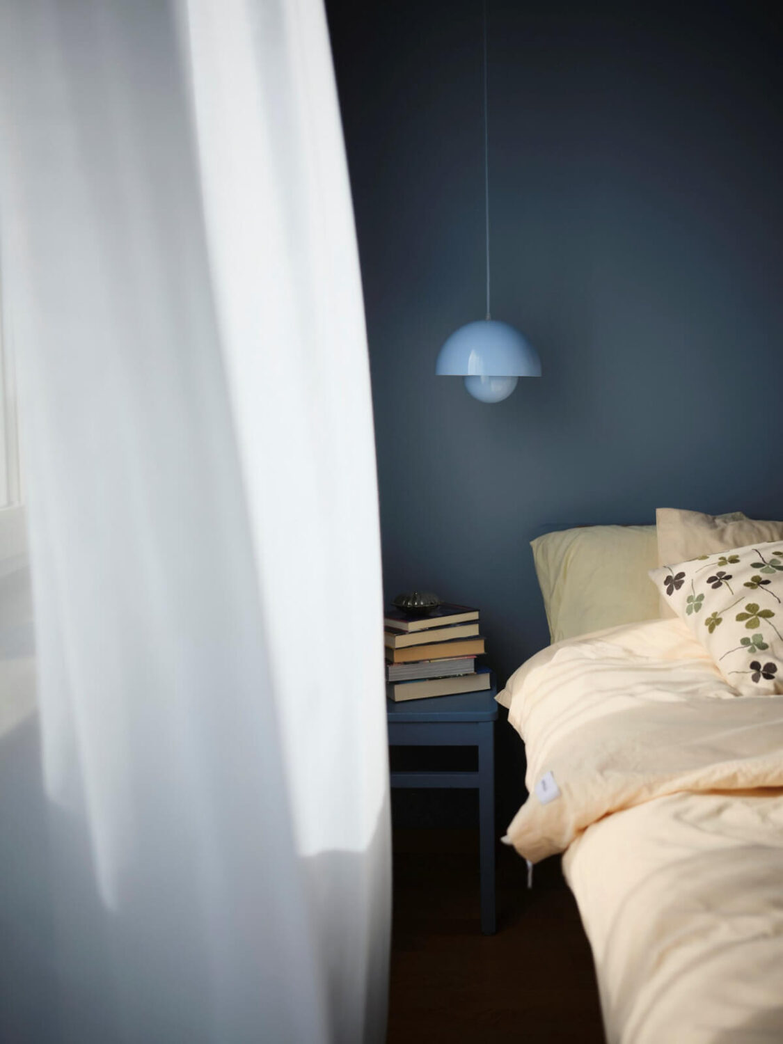 A 1940s Swedish Apartment with a Soft Yellow Kitchen 16 blue bedroom detail
