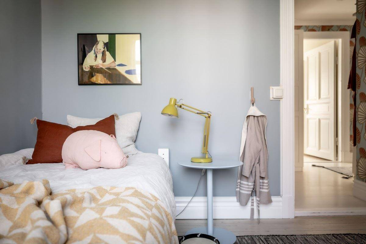 blue bedroom A Bright Swedish Apartment with Subtle Color Accents