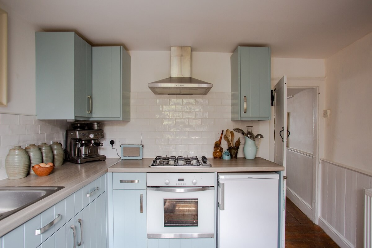 A Charming 400-Year-Old Cottage in England 11 blue kitchen