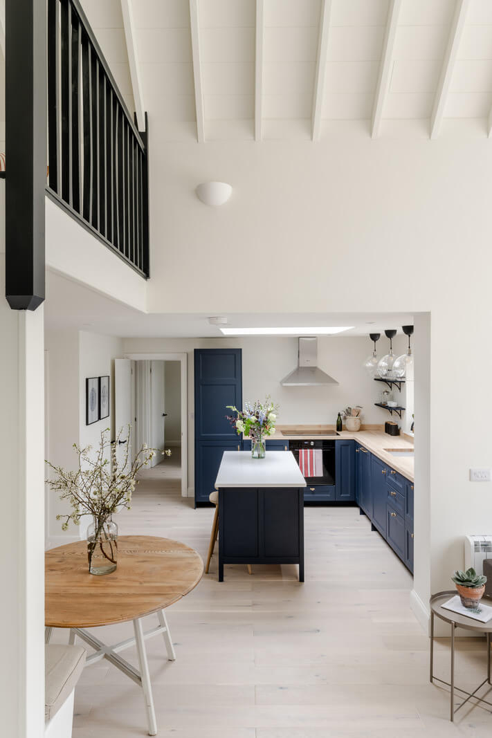 The Pros and Cons of a Wooden Kitchen Countertop 5 blue kitchen with island