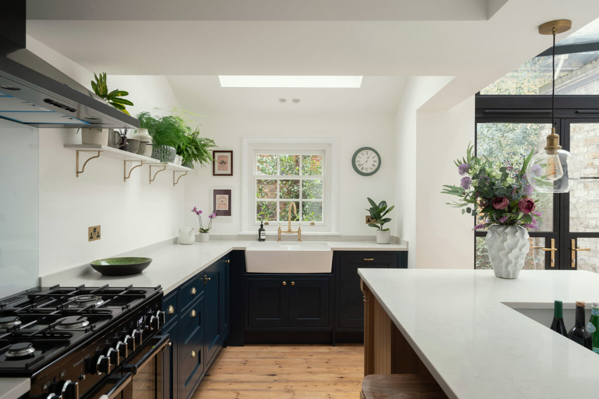 blue kitchen with skylight