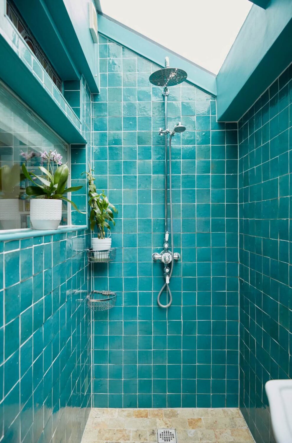 40+ Colorful Bathrooms That Will Spruce Up Your Home 5 blue shower with skylight