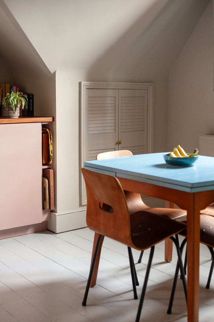Pastel Tones and Midcentury Design in a Top Floor London Apartment 10 blue table top detail