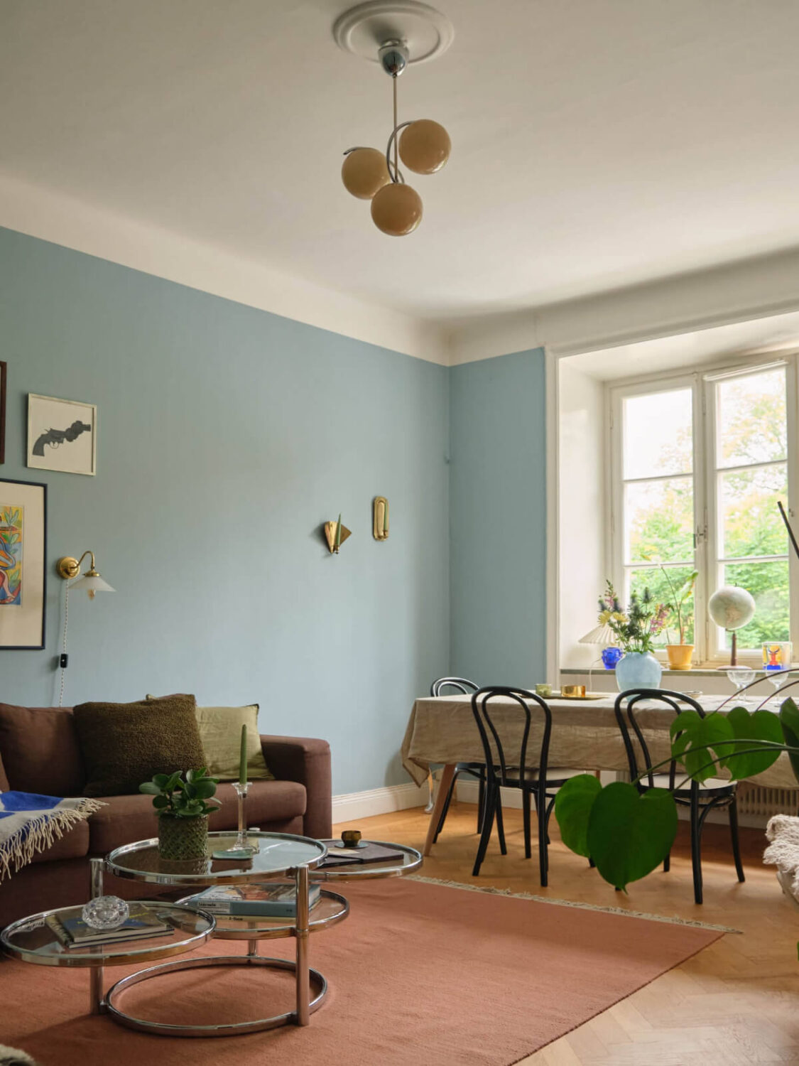 A Beautiful Color Palette and Historic Elements in a Stockholm Apartment 3 blue walls scandinavian living room