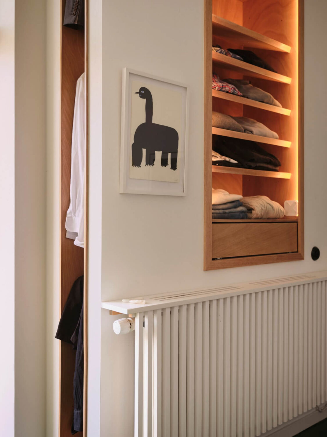 A Bright Family Apartment in a 1950s School Building 20 built-in clothes storage