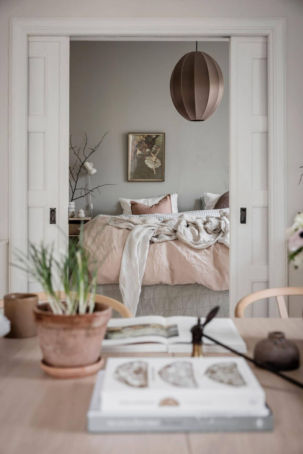 A Light Corner Apartment with an Open Flowing Floor Plan 32 calm bedroom blush bedding