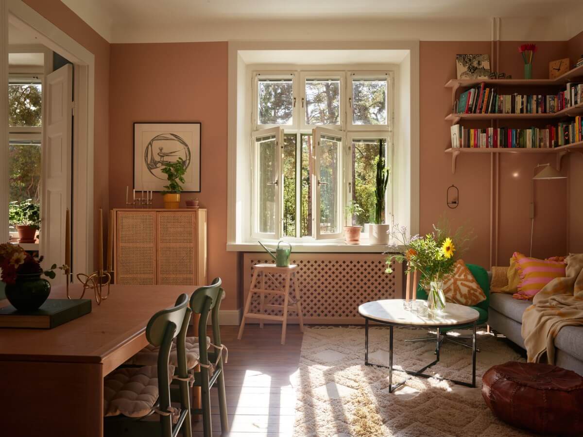 Pantone Color of the Year 2025: Mocha Mousse Interior Inspiration 7 charming brown living room sunlight bookshelves nordroom Pantone Color of the Year 2025: Mocha Mousse Interior Inspiration