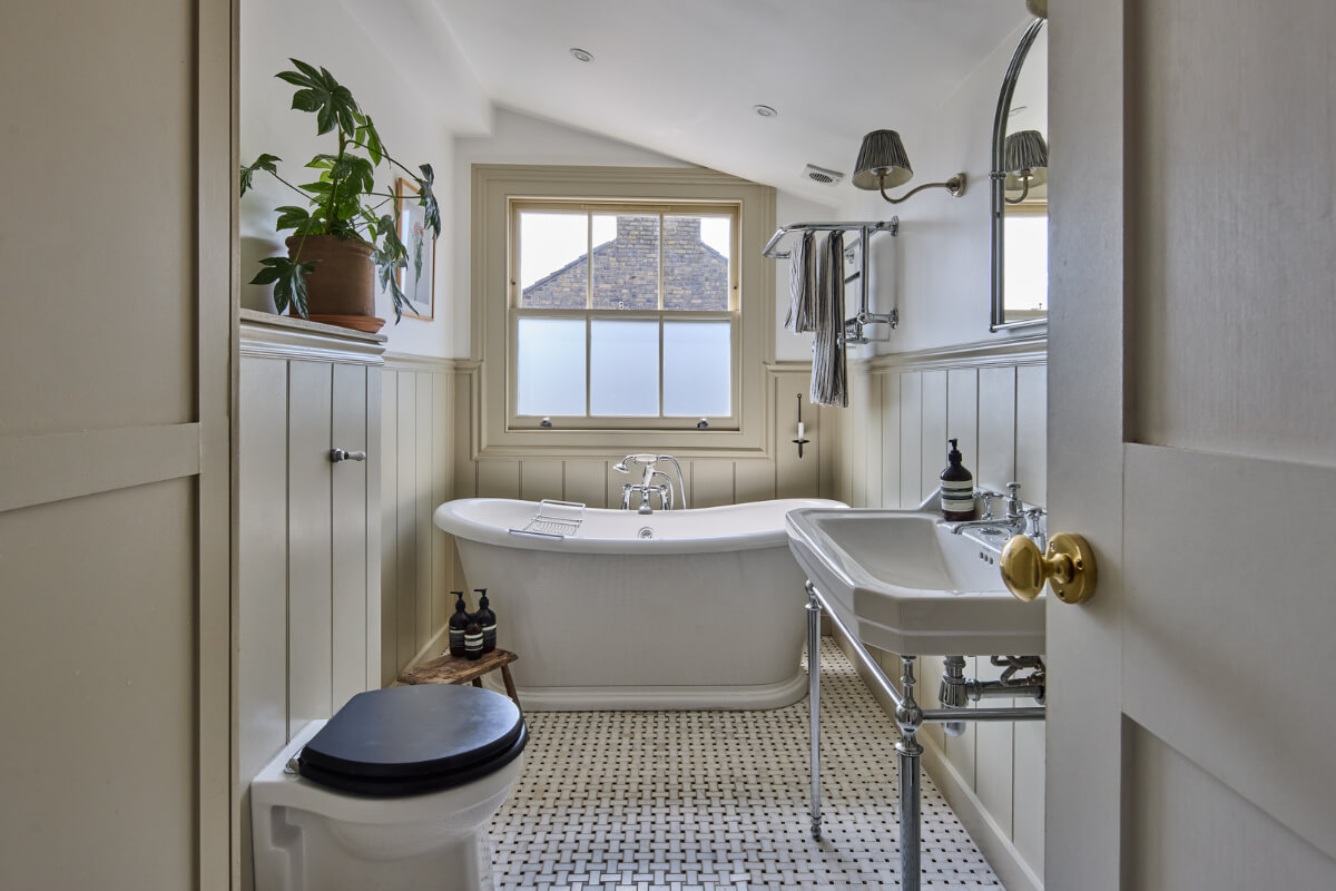 A 19th Century London Cottage with a Stunning Kitchen Extension 20 classic bathroom paneling freestanding bath