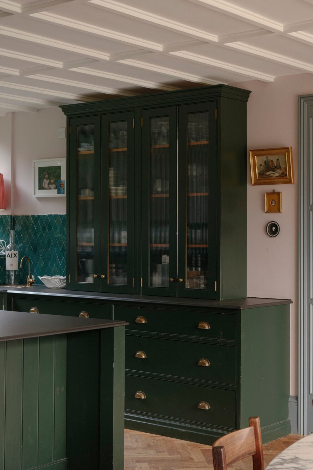 A Barn House with Vintage Decor and Exposed Beams 12 closed and glass kitchen cabinets