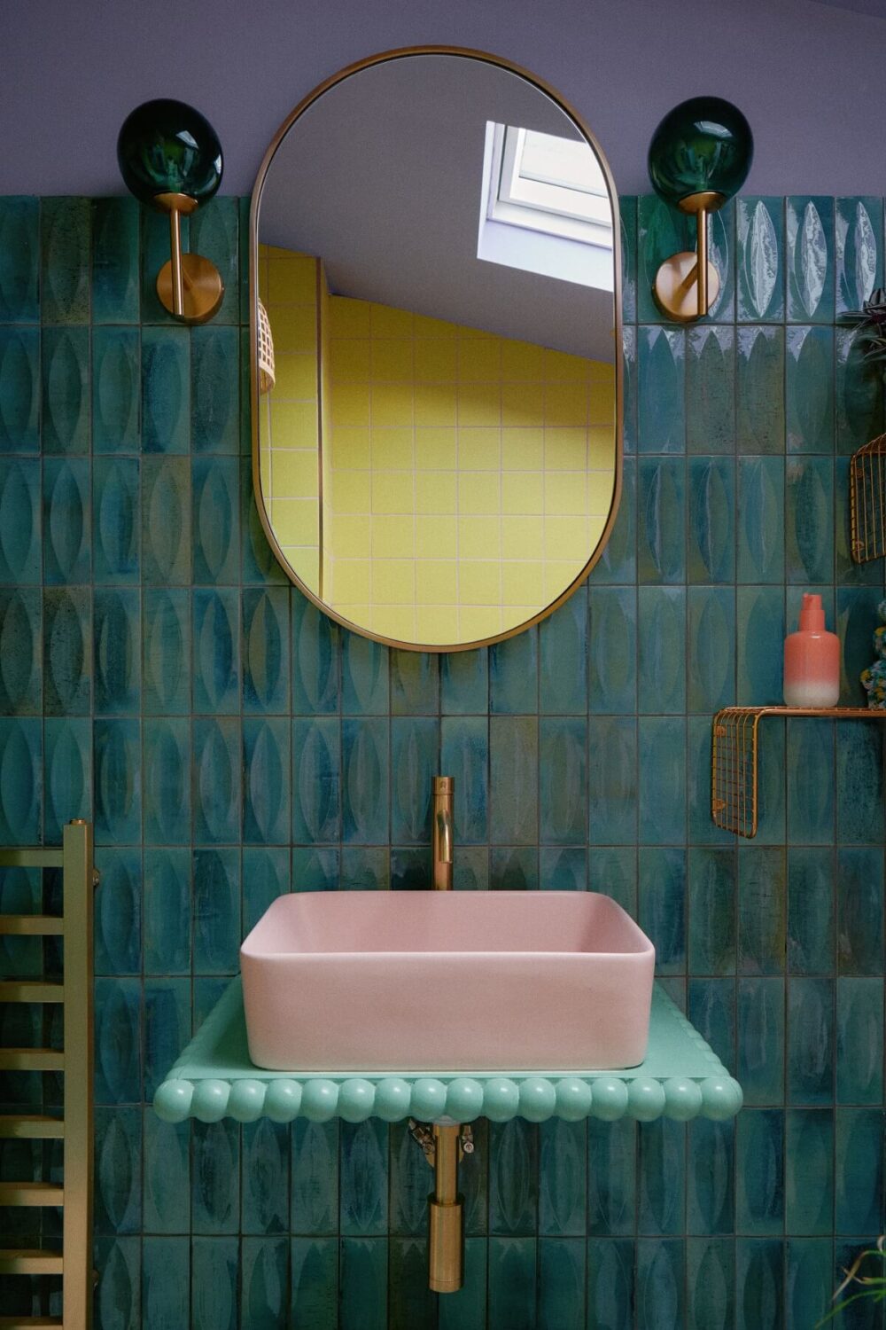 40+ Colorful Bathrooms That Will Spruce Up Your Home 7 colorful-bathroom-green-tiles-pink-sink-nordroom