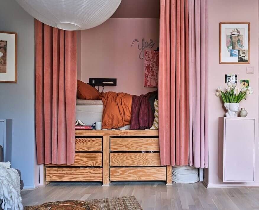 52 Studio Apartments with a Curtain Room Divider 13 colorful-bed-nook-pink-curtains-storage-bed-nordroom