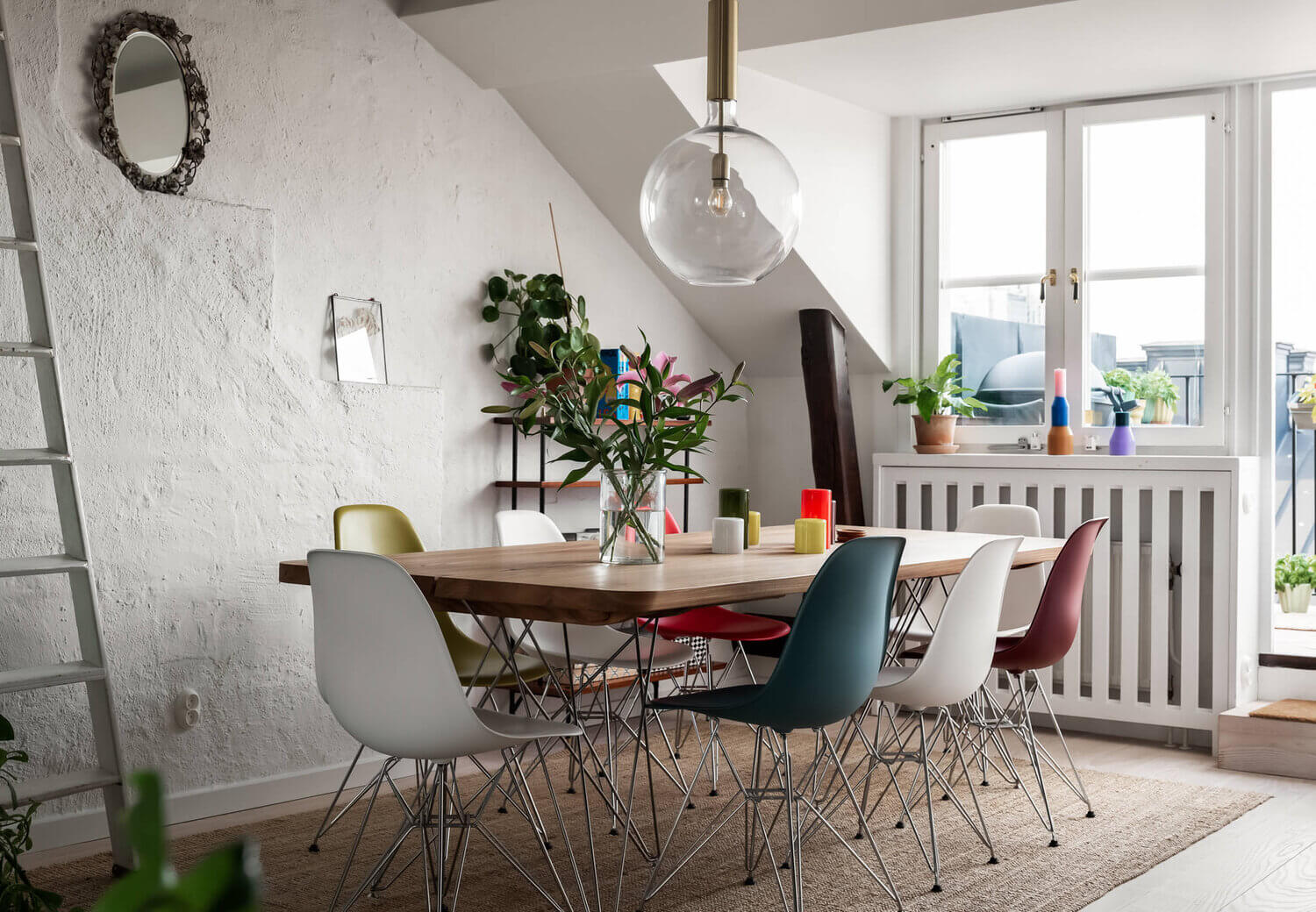 A Scandinavian Penthouse Apartment With A Dark Green Kitchen 10 colorful eames dining chair penthouse nordroom A Scandinavian Penthouse Apartment With A Dark Green Kitchen