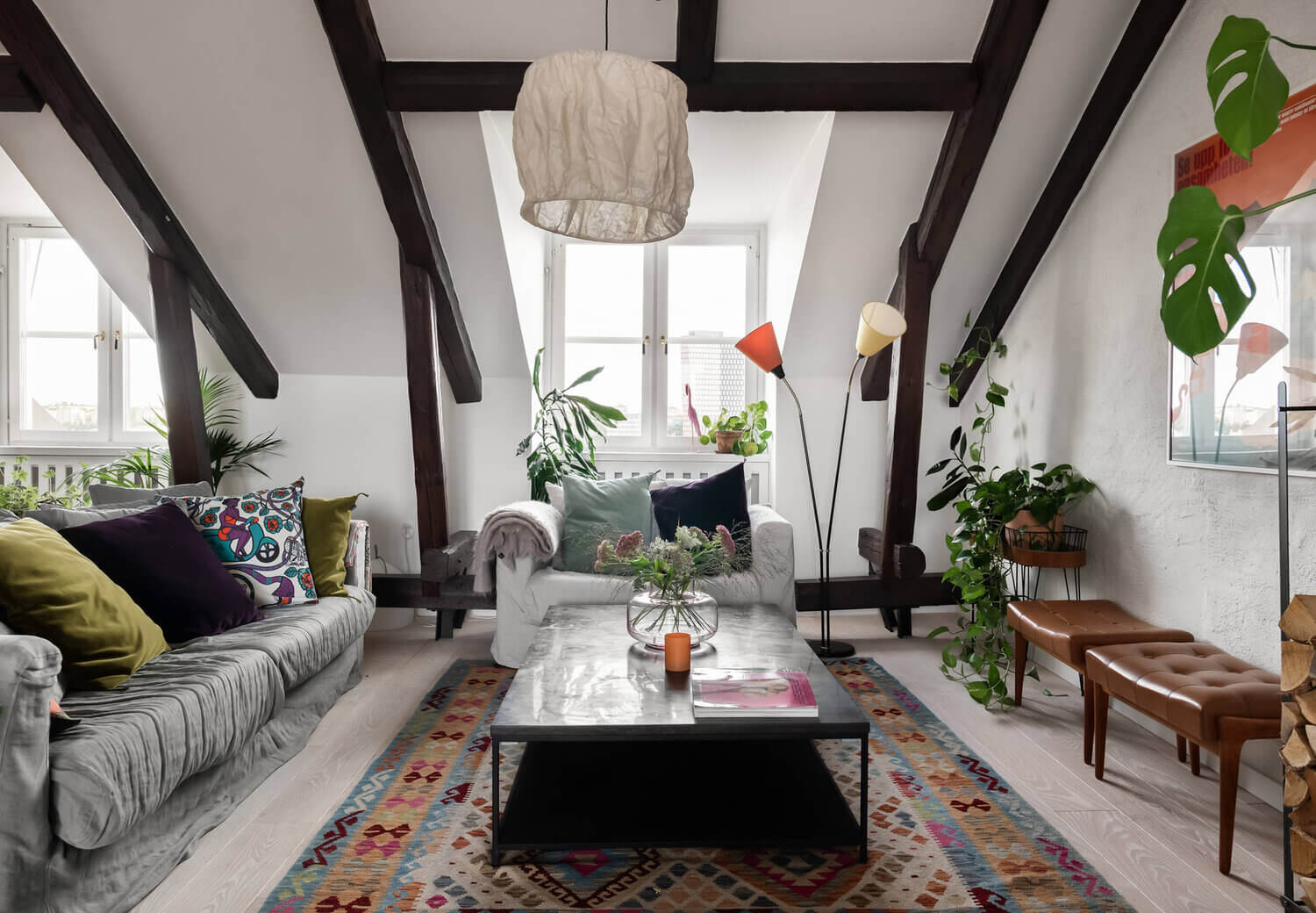 A Scandinavian Penthouse Apartment With A Dark Green Kitchen 3 colorful rug penthouse scandinavian nordroom A Scandinavian Penthouse Apartment With A Dark Green Kitchen