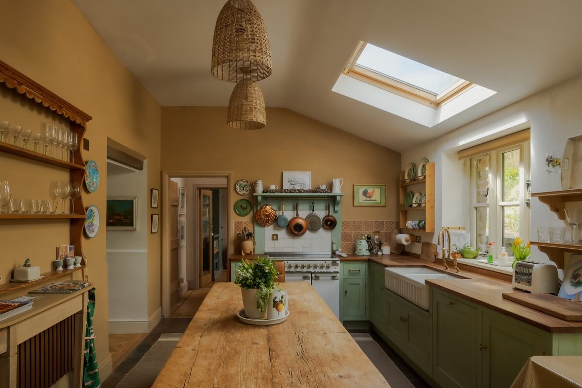 Yellow Kitchen Design Ideas (with Paint Colors) 45 cottage kitchen with skylight and farmhouse table nordroom