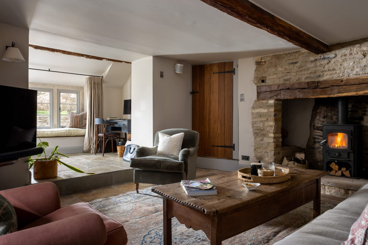 A Charming Cotswold Cottage with a deVOL Kitchen 7 cottage living room brick hearth window seat