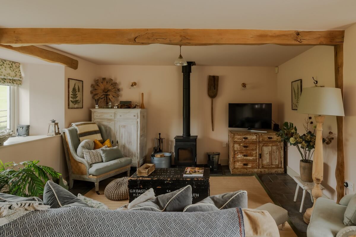 cottage living room with wooden beam