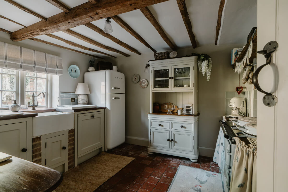 country style kitchen stone floor exposed beams