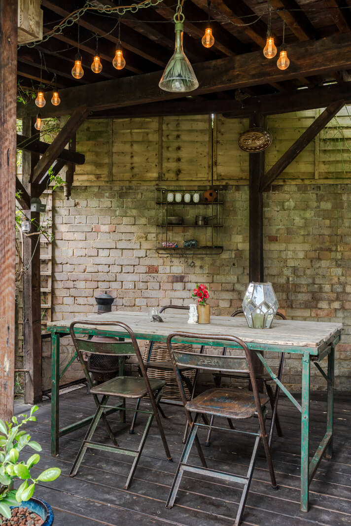 A Victorian Home with a Rich Color Palette and a Beautiful Garden 27 covered garden seating london home A Victorian Home with a Rich Color Palette and a Beautiful Garden