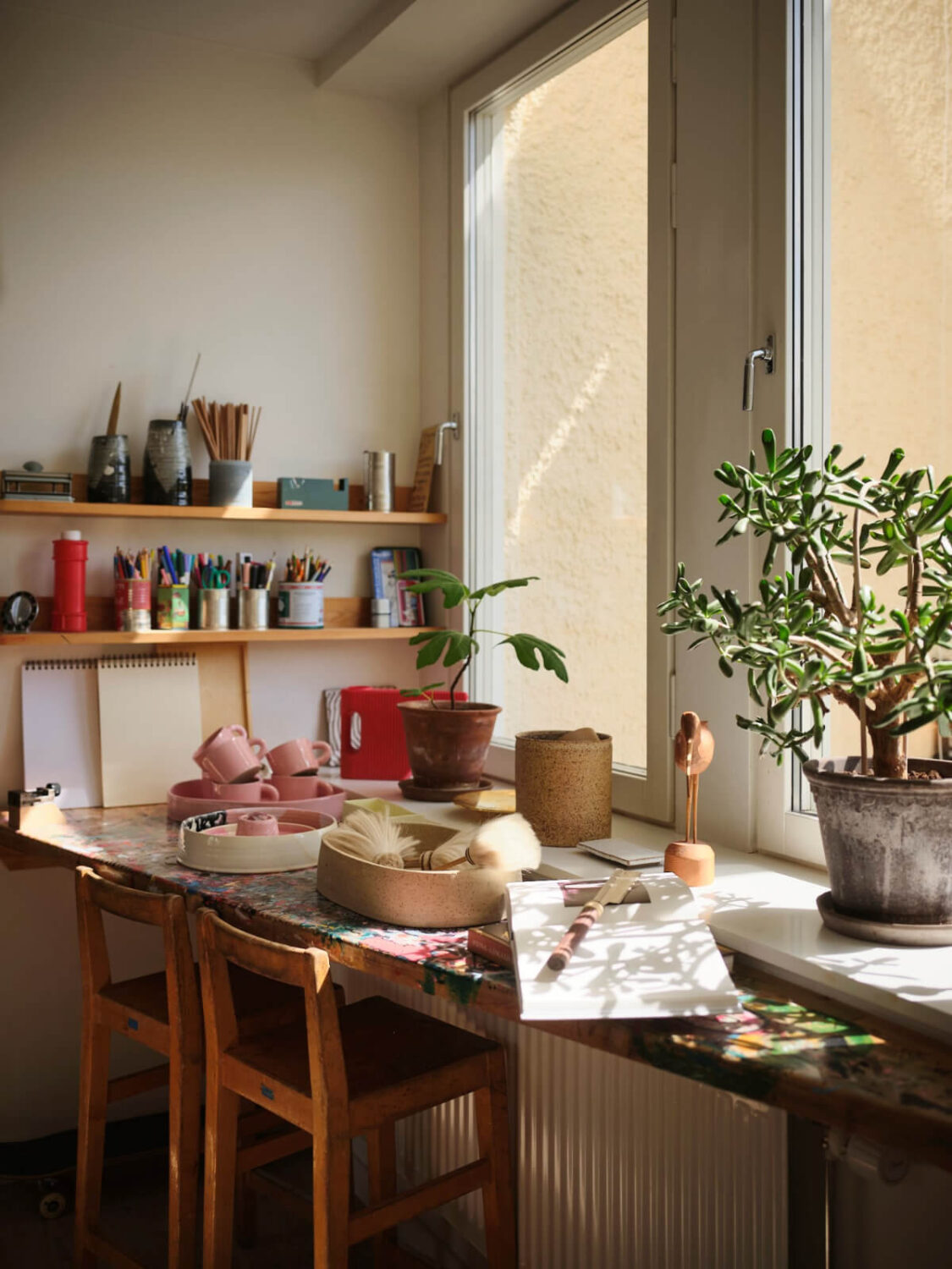 A Bright Family Apartment in a 1950s School Building 14 craft table under window